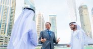 Image showing 3 men talking in Dubai